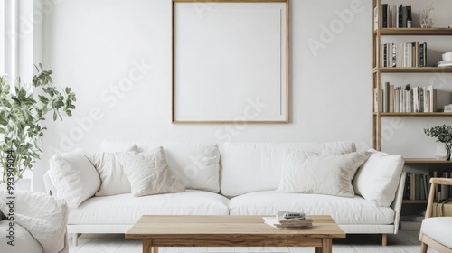 Natural wood coffee table near white sofa and bookcase White wall with art poster frame Minimalist boho interior design of modern living room, home