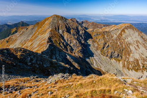 Picturesque landscape of the Tatra Mountains. The Mts. Pachol and Spalena from the Mount Banikov, Western Tatras. photo