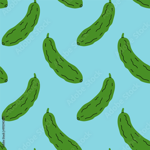 Repetitive pattern of green cucumbers on a light blue backdrop creating a playful design