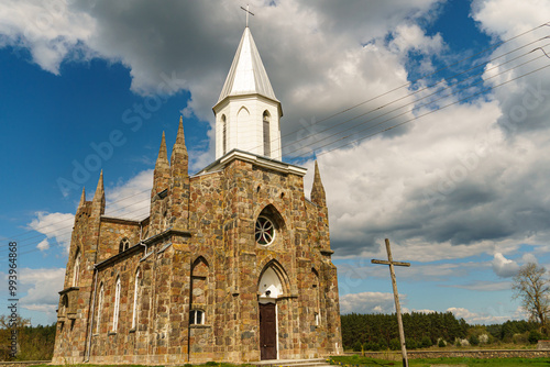 The Catholic church. The old red brick church. A historical building with a religious purpose.