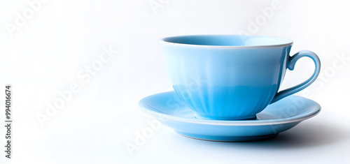 Minimalist Blue Coffee Cup with Saucer on White Background Design