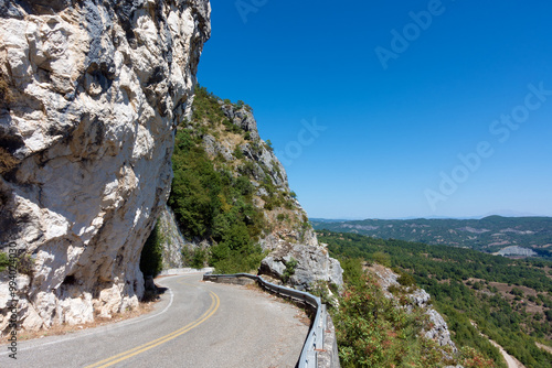 Amazing mountainous scenery near Spilaio village, Grevena, Greece, with an adventurous road perfect for motorcycles