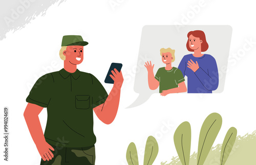 A soldier talks to his wife and child through a video call. Online communication with family while serving in the army.