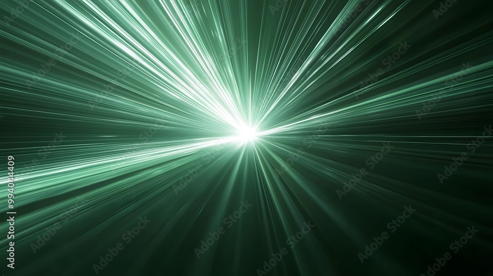 Fototapeta premium Dynamic green light rays radiating from a central point, creating a sense of motion.