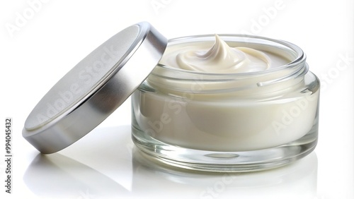 A clear glass jar filled with a smooth, translucent petroleum-based moisturizer sits on a white background, its lid slightly ajar, revealing a creamy texture.