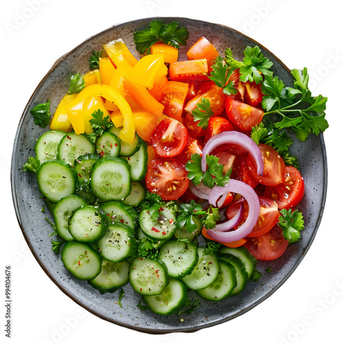 Fresh vegetable salad with cucumbers, tomatoes, yellow peppers, red onions, and parsley, isolated on transparent background, ideal for healthy eating and diet concepts