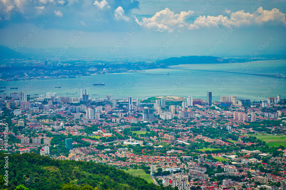 Stunning panoramic birds eye view of the city of Georgetown,Penang straits and the Malaysian mainland from the top of Penang Hill viewpoint in Georgetown,Penang,Malaysia Stunning panoramic birds eye view of the city of Georgetown,Penang straits and the Malaysian mainland from the top of Penang Hill viewpoint in Georgetown,Penang,Malaysia