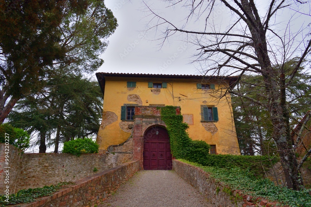 view of the ancient Aiola Castle dating back to the 13th century and located near Vagliagli, Siena, Italy view of the ancient Aiola Castle dating back to the 13th century and located near Vagliagli, Siena, Italy