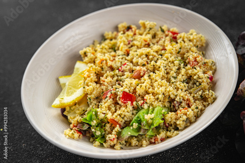 tabbouleh vegetable bulgur couscous dish fresh delicious vegetarian and vegan food gourmet food background on the table rustic food top view copy space