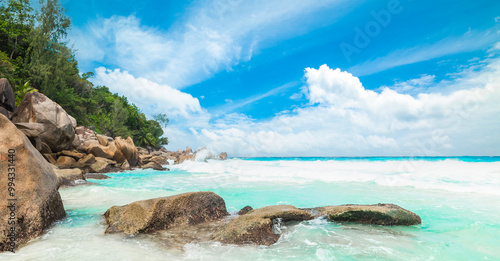 Turquoise water and rocks ina tropical beach photo