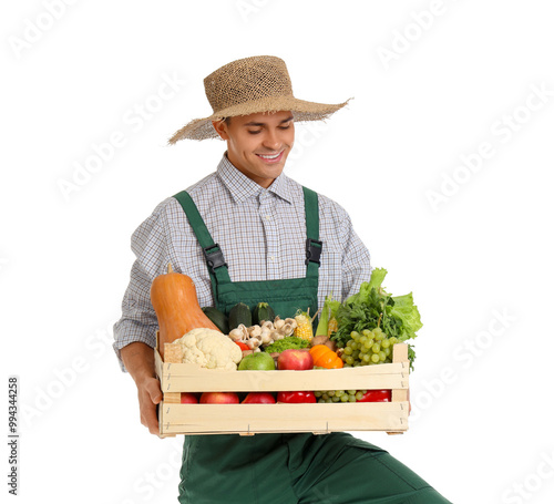 Male farmer with box of veg...