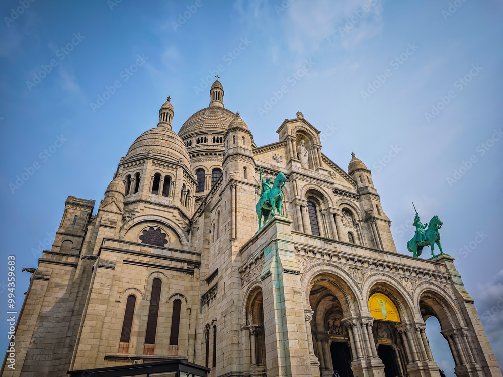 Basilique Du Sacre Coeur de Montmartre. Close up photo of Sacred heart iconic white-domed church in Paris, France Basilique Du Sacre Coeur de Montmartre. Close up photo of Sacred heart iconic white-domed church in Paris, France