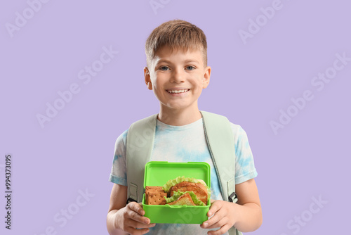 Little boy with school lunc...