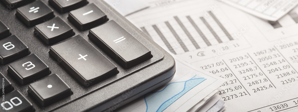 calculator and financial charts. Investment and capital accumulation concept calculator and financial charts. Investment and capital accumulation concept