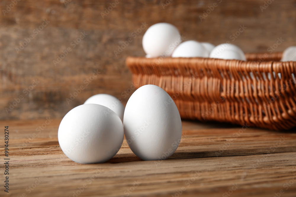 Raw chicken eggs on wooden background Raw chicken eggs on wooden background