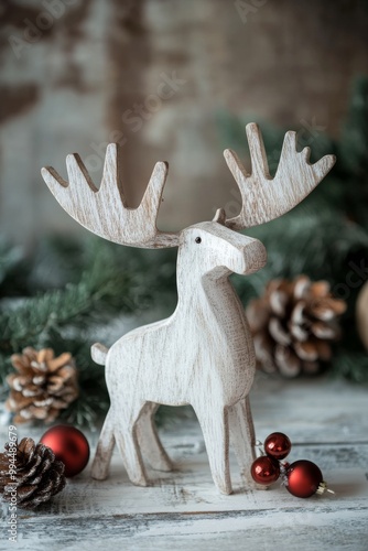 A decorative white moose figurine amidst festive holiday decorations and glow...