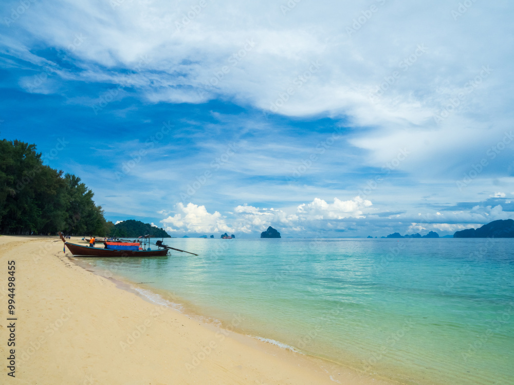 Obraz premium Landscape beautiful summer panorama horizon look view tropical shore open sea beach cloud clean blue sky background calm nature ocean wave water nobody travel at Koh Kradan Trang Thailand day time