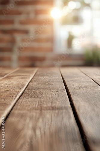 Sunlight streaming through windows onto wooden floor in a cozy indoor space d...