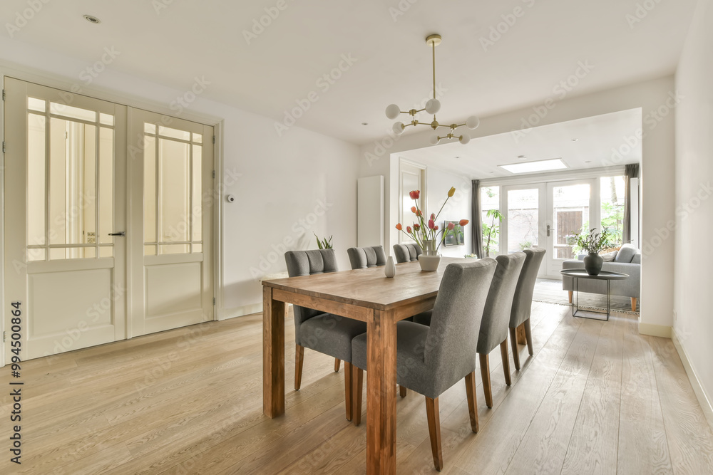 Modern dining room with wooden table and cozy design Modern dining room with wooden table and cozy design