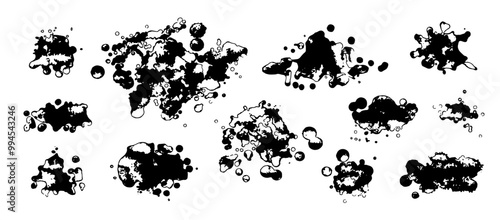 A collection of abstract black ink splatter shapes on a white background. Irregular and artistic blot patterns vary in size and form.