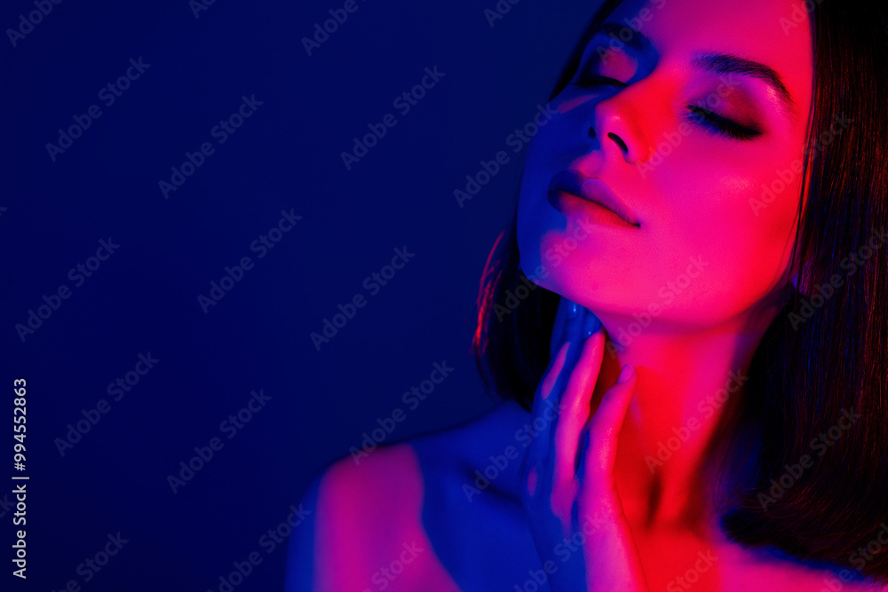 Close up photo of girl touch neck feel gentle flawless smooth skin isolated neon multicolor background Close up photo of girl touch neck feel gentle flawless smooth skin isolated neon multicolor background
