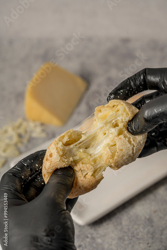 Homemade cheese scone on grey background