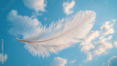 Single feather floating the air on a bright blue sky background