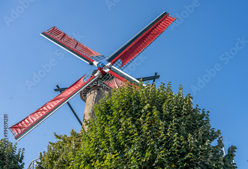 Old classic windmill on the Zeeuws West Vlaanderen island of the Netherlands photo