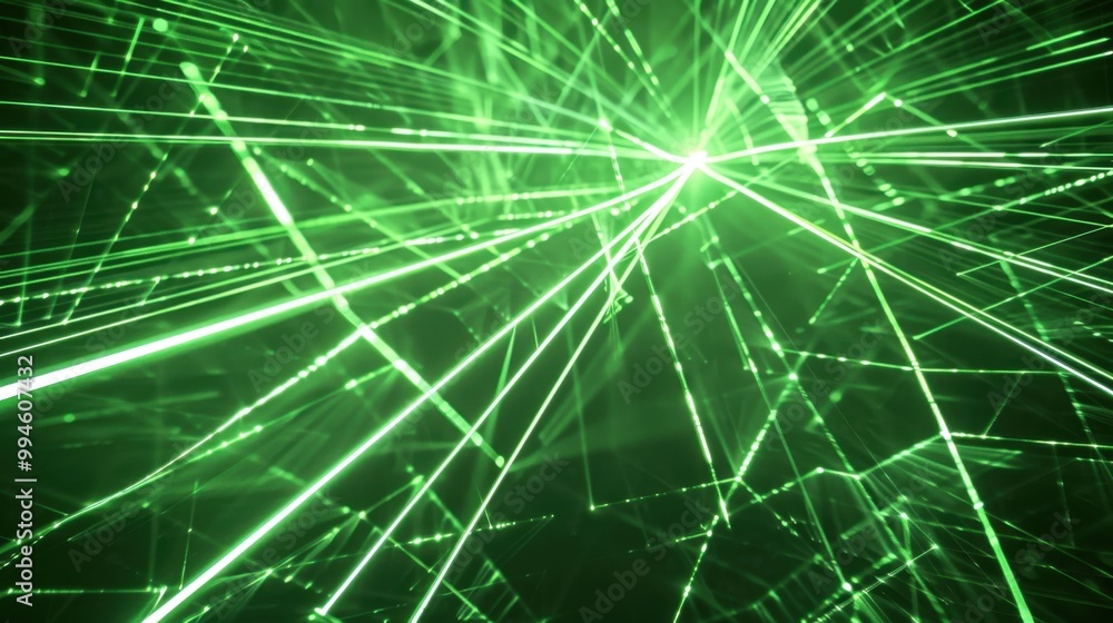 Obraz premium Bright green laser beams creating sharp, angular patterns on a black backdrop, glowing vividly in a high-energy visual