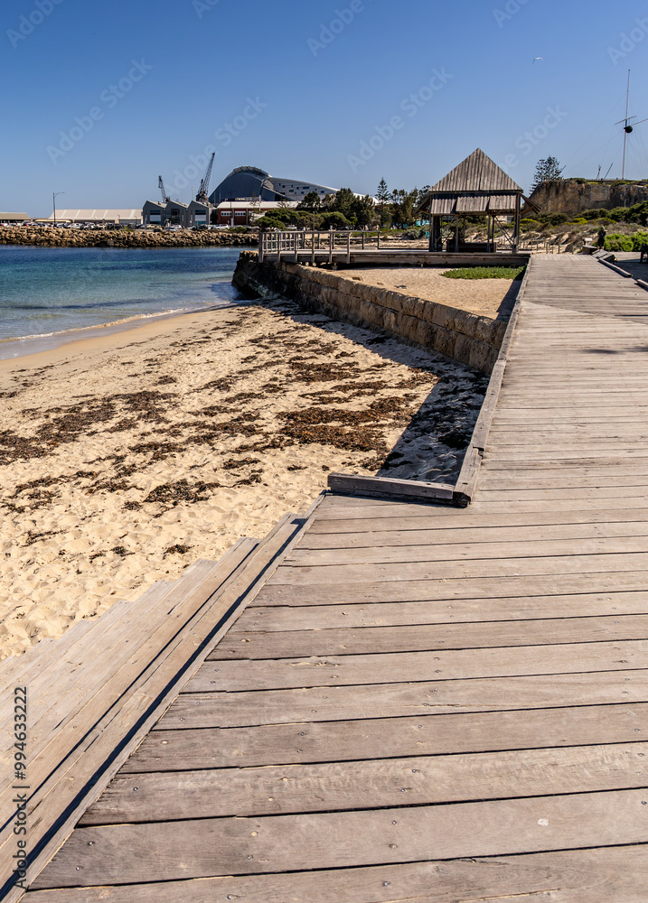 The wooden walkway at Bather's Beach Fremantle Western Australia, looking towards the Maritime Museum and the Roundhouse. The wooden walkway at Bather's Beach Fremantle Western Australia, looking towards the Maritime Museum and the Roundhouse.