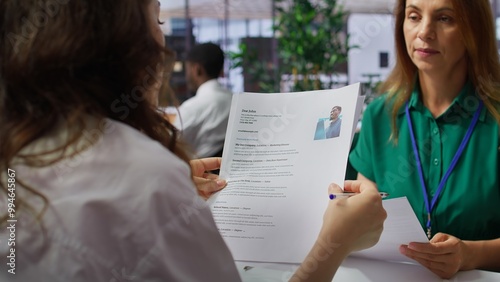 Tableau sur toile HR employers analyzing candidate CV after the job interview, carefully evaluating all qualifications and business administration knowledge or experience
