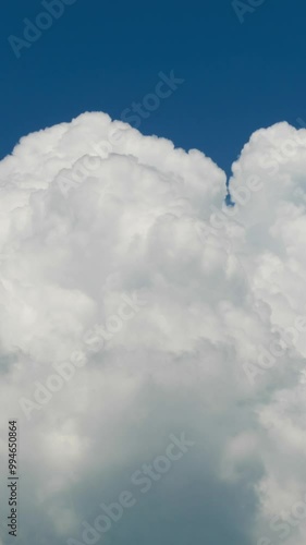 Vertical video of a big thunder clouds, high qualitative time lapse, no flicker.
