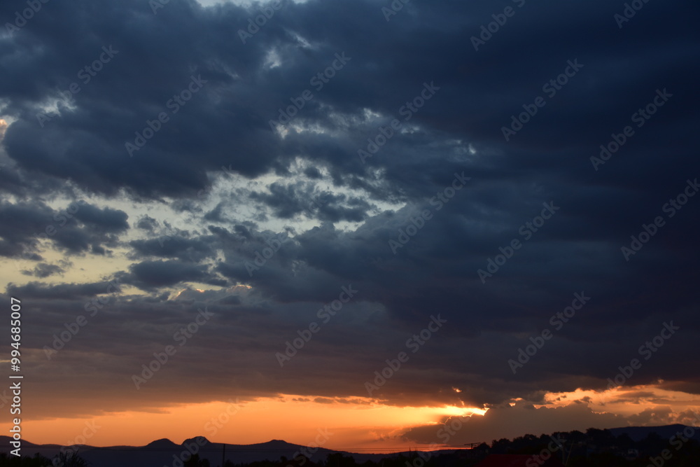 clouds over a sunset clouds over a sunset