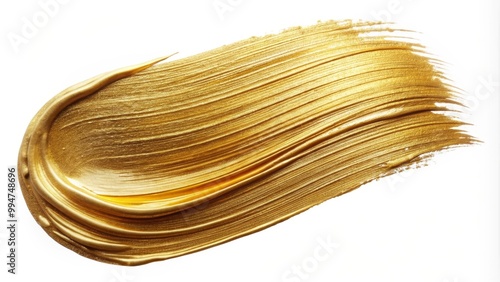 Gold paint brush stroke creating abstract shape on white background
