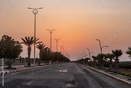 Sunset over a road on Farasan island, Saudi Arabia photo