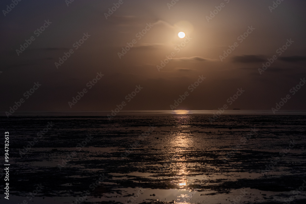 Moon shining over a coast of Farasan island, Saudi Arabia Moon shining over a coast of Farasan island, Saudi Arabia