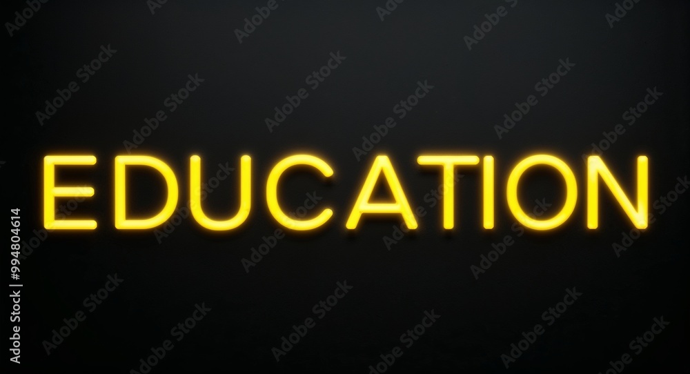 Obraz premium education word lettering with yellow glow on plain black dark background