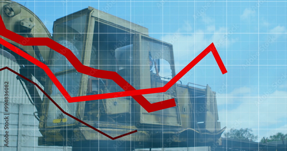 Fototapeta premium Red arrow and grid image over construction equipment in industrial setting