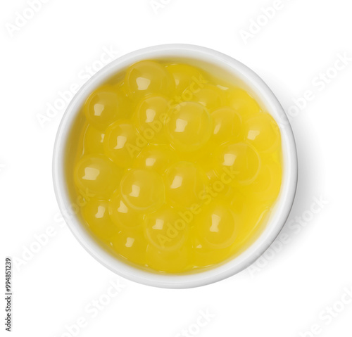 Bright tapioca pearls in bowl isolated on white, top view