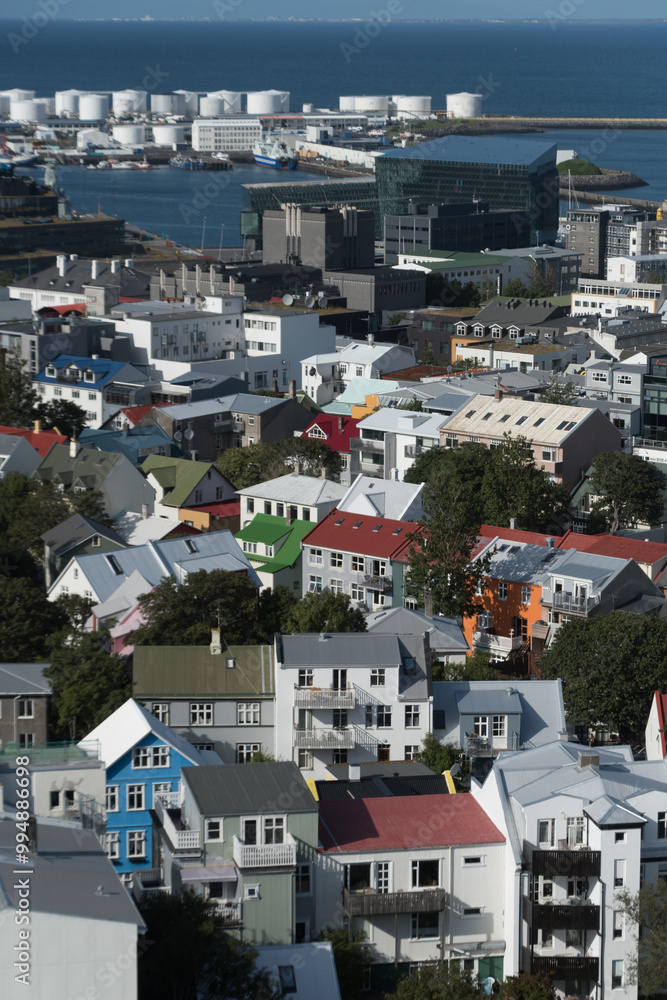 Fototapeta premium Aerial view on beautiful roofs and buildings surrounding downtown in Reykjavik - 2