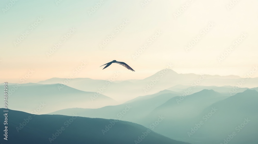 A serene lake surrounded by mountains seen from above, emphasizing the peacefulness of flying. A serene lake surrounded by mountains seen from above, emphasizing the peacefulness of flying.