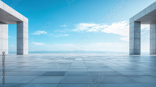 An empty square SLATE pavement with a blue sky as the background photo