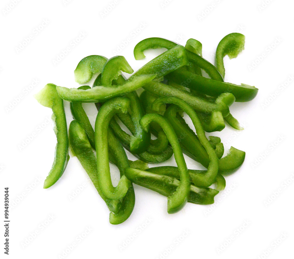 Sliced green bell pepper in a bowl on white background Sliced green bell pepper in a bowl on white background