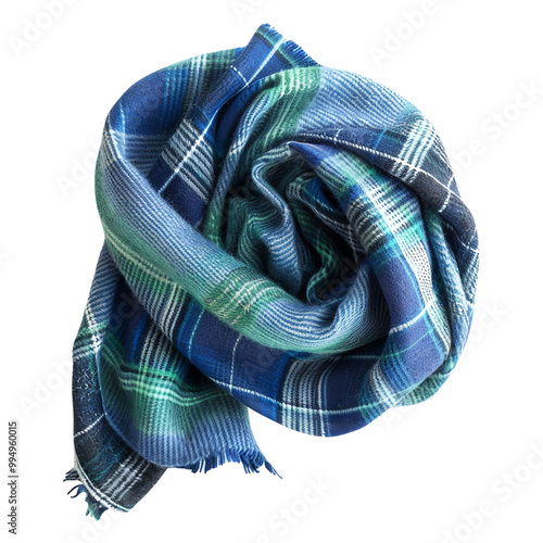 Close-up of a rolled plaid scarf in shades of blue and green, isolated on white background. Cozy fashion accessory for cold weather. photo