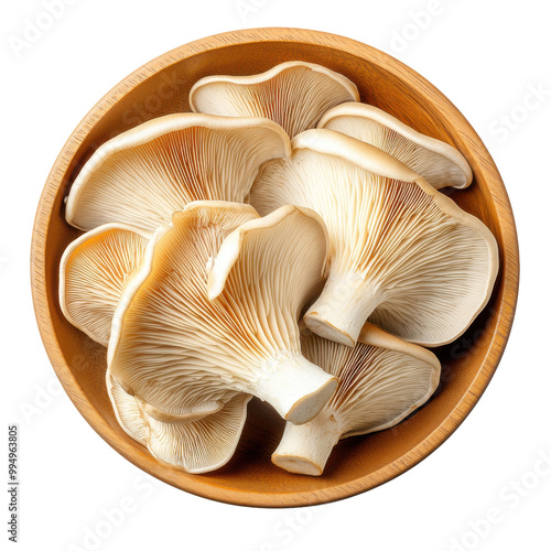 Fresh oyster mushrooms displayed in a wooden bowl on a white background.