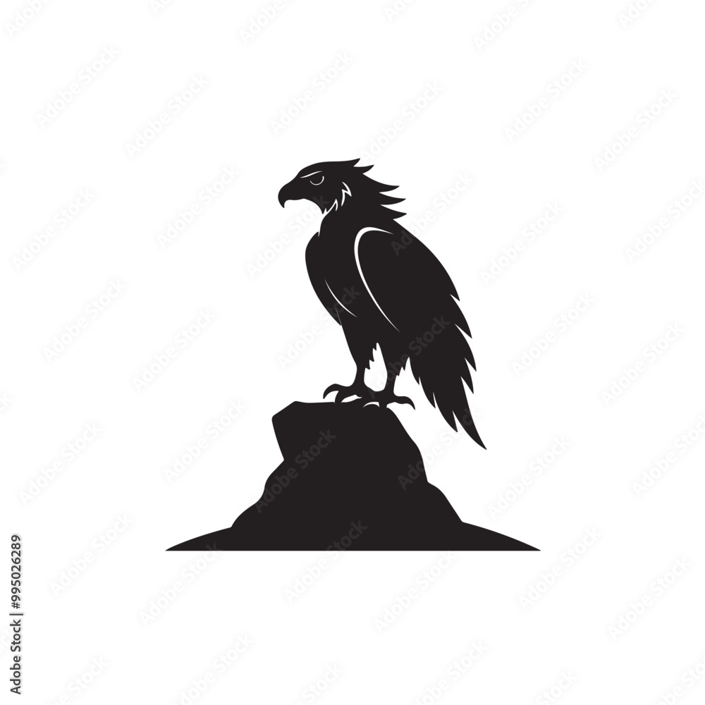 Fototapeta premium A powerful black silhouette of an eagle with its wings spread wide in full extension