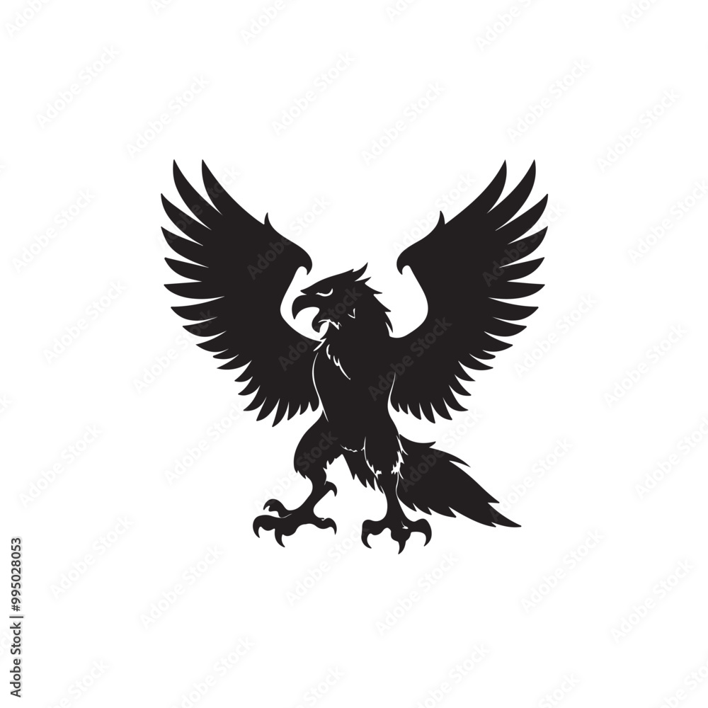 Obraz premium A powerful black silhouette of an eagle with its wings spread wide in full extension