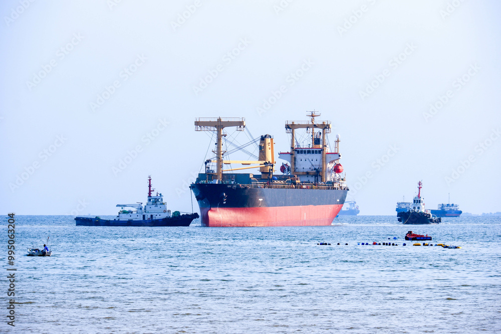oil transport ship at the port industry in export logistics and international shipping by containers oil transport ship at the port industry in export logistics and international shipping by containers