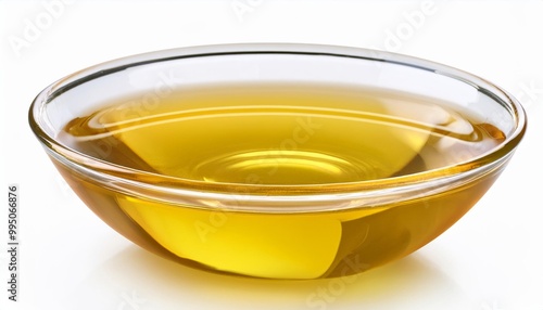 Glass Bowl of Yellow Oil on White Background