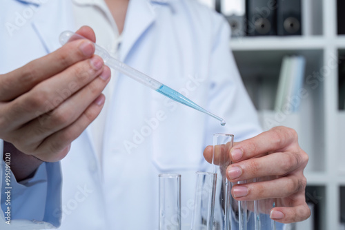 Scientists Conducting Research with Test Tubes in a Modern Laboratory Setting